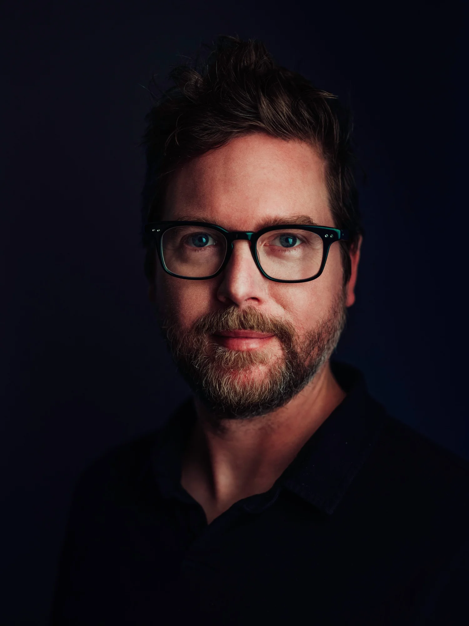 Founder portrait in low light